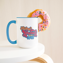 Feeling_Groovy_-_1945_-_Blue_-_15_Ounce_Lifestyle_Donut_LH_Mockup.png