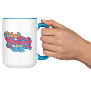 Feeling_Groovy_-_1945_-_Blue_-_15_Ounce_Lifestyle_RH_Cheers_Mockup.png