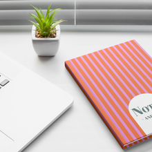 Hardcover_Notebook_Journal_-_Pink_and_Or_Lifestyle_1_Mockup.png