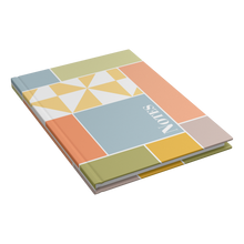 Hardcover_Notebook_Journal_-_Pinwheels_Closed_Cover_Angle_Mockup.png