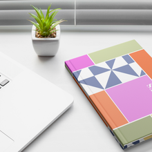 Hardcover_Notebook_Journal_-_Pinwheels_a_Lifestyle_1_Mockup.png