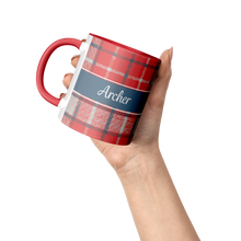 Plaid_8_-_Red_-_11_Ounces_Lifestyle_Raised_Hand_Mockup.png