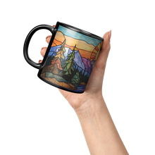 Wilderness_49_-_Black_Black_-_11_Ounce_Lifestyle_Raised_Hand_LH_Mockup.png